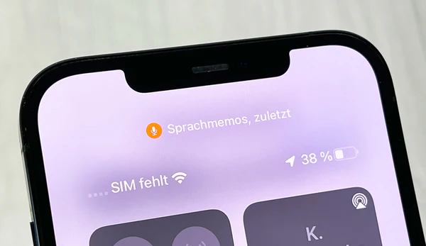 Points orange du micro sur l'iphone